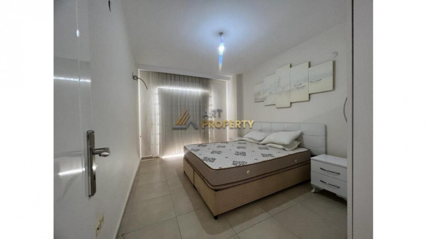 Просторная меблированная квартира планировки 1+1 в районе Махмутлар - Ракурс 2