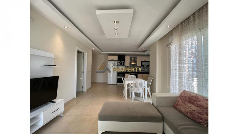 Просторная меблированная квартира планировки 1+1 в районе Махмутлар - Ракурс 3