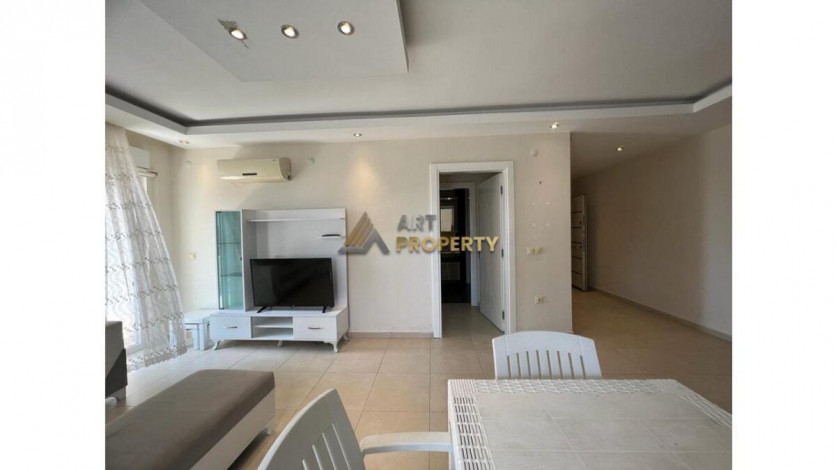 Просторная меблированная квартира планировки 1+1 в районе Махмутлар - Ракурс 6