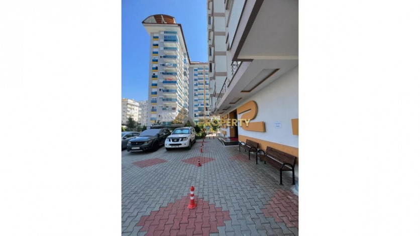 Просторная меблированная квартира планировки 1+1 в районе Махмутлар - Ракурс 10