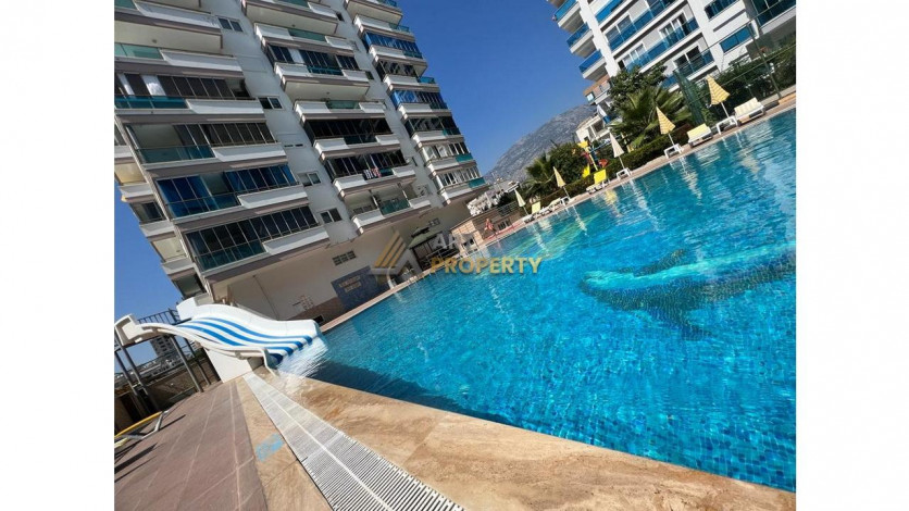 Просторная меблированная квартира планировки 1+1 в районе Махмутлар - Ракурс 12