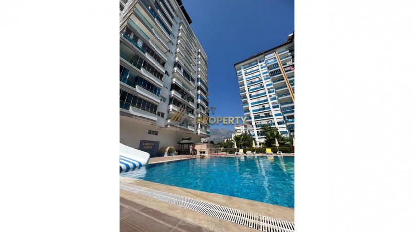 Просторная меблированная квартира планировки 1+1 в районе Махмутлар - Ракурс 14