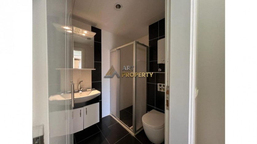 Просторная меблированная квартира планировки 1+1 в районе Махмутлар - Ракурс 23