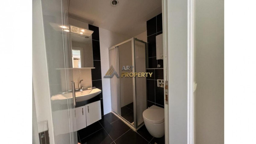 Просторная меблированная квартира планировки 1+1 в районе Махмутлар - Ракурс 24