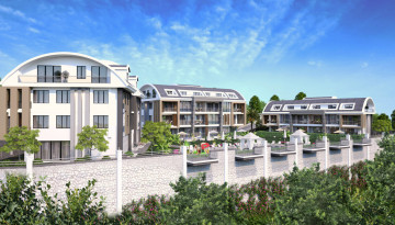 Апартаменты планировки 2+1 и 3+1 в новом жилом комплексе, центр Алании - Ракурс 1