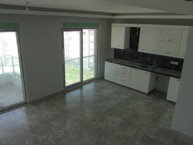 Апартаменты планировки 1+1, 2+1, 3+1, 4+1 в жилом комплексе в районе Каргыджак - Ракурс 15