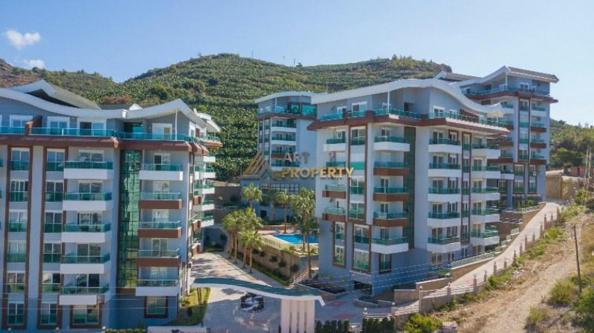 Апартаменты планировки 1+1, 2+1, 3+1, 4+1 в жилом комплексе в районе Каргыджак - Ракурс 34