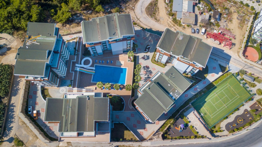 Апартаменты планировки 1+1, 2+1, 3+1, 4+1 в жилом комплексе в районе Каргыджак - Ракурс 35