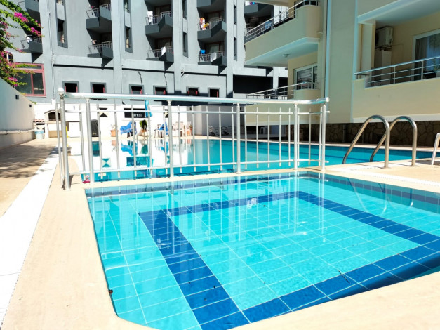 Меблированная квартира планировки 1+1, 60м2 в престижном районе Оба - Ракурс 14