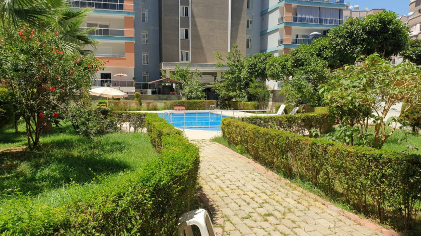 Просторный пентхаус планировки 4+1 с видом на море в районе Махмутлар - Ракурс 4