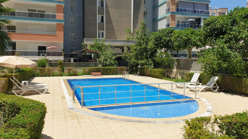 Просторный пентхаус планировки 4+1 с видом на море в районе Махмутлар - Ракурс 8