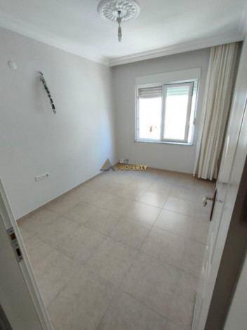 Просторный пентхаус планировки 4+1 с видом на море в районе Махмутлар - Ракурс 9