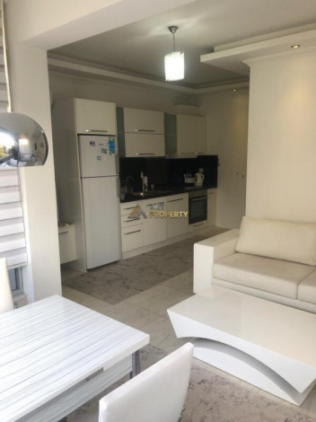 Меблированная квартира планировки 1+1, 55м2 в центре города Аланья - Ракурс 5