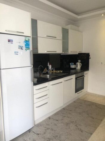 Меблированная квартира планировки 1+1, 55м2 в центре города Аланья - Ракурс 13