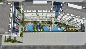 Апартаменты планировки 1+1, 65м2 в ЖК на стадии строительства, центр Алании - Ракурс 9