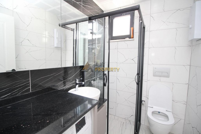 Уютная меблированная квартира планировки 1+1, 40м2 в центре Алании - Ракурс 9