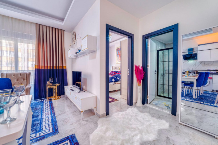 Меблированная квартира планировки 1+1, 60м2 в районе Махмутлар - Ракурс 24