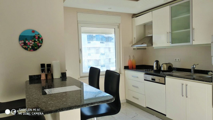 Апартаменты 2+1 у моря в одном из лучших комплексов района Тосмур, 110 м2 - Ракурс 21