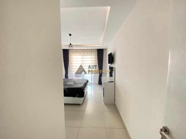 Меблированная квартира планировки 1+1, 70м2 в районе Махмутлар - Ракурс 7