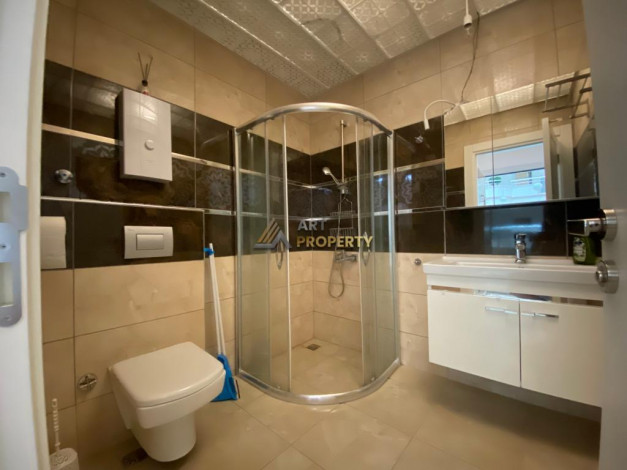 Меблированная квартира планировки 1+1, 70м2 в районе Махмутлар - Ракурс 8