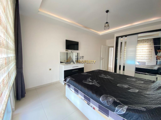 Меблированная квартира планировки 1+1, 70м2 в районе Махмутлар - Ракурс 9