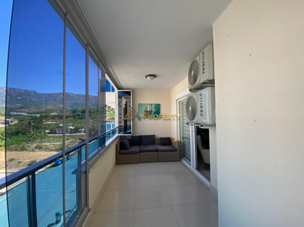 Меблированная квартира планировки 1+1, 70м2 в районе Махмутлар - Ракурс 10