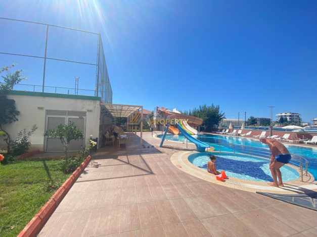 Меблированная квартира планировки 1+1, 70м2 в районе Махмутлар - Ракурс 13