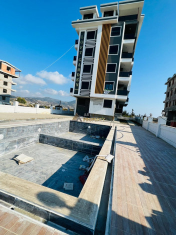 Новая квартира планировки 2+1, 80м2 в районе Газипаша, Аланья - Ракурс 9