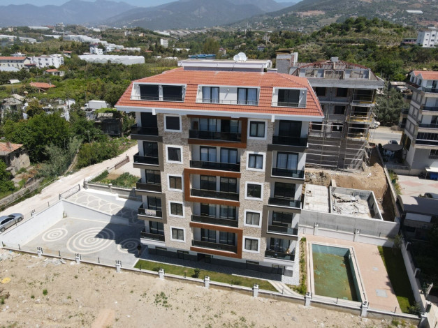 Меблированная квартира планировки 1+1, 59м2 в районе Кестель - Ракурс 33