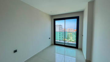 Апартаменты планировки 2+1, 65,5м2 в новом жилом комплексе, Махмутлар - Ракурс 13