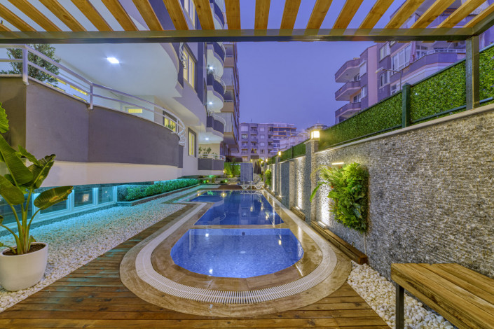 Меблированные апартаменты 2+1 и 4+1 в районе Махмутлар - Ракурс 9