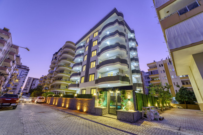 Меблированные апартаменты 2+1 и 4+1 в районе Махмутлар - Ракурс 32