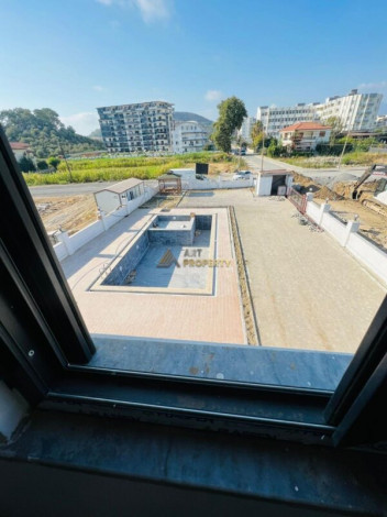 Квартира 1+1 на завершающем этапе строительства в районе Махмутлар, 60 м2 - Ракурс 14