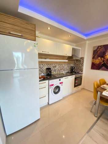 Меблированная квартира планировки 1+1, 65м2 в районе Махмутлар - Ракурс 5