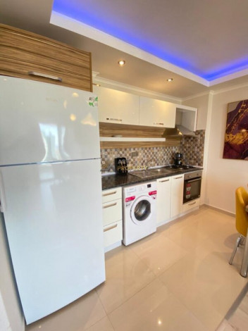 Меблированная квартира планировки 1+1, 65м2 в районе Махмутлар - Ракурс 7