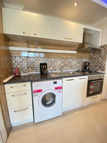 Меблированная квартира планировки 1+1, 65м2 в районе Махмутлар - Ракурс 10