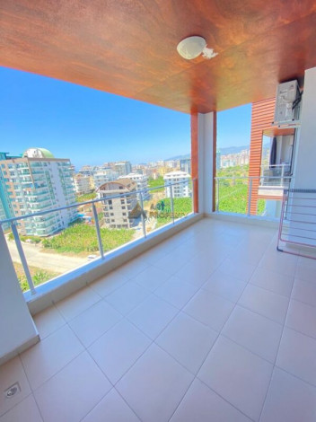 Меблированная квартира планировки 1+1, 65м2 в районе Махмутлар - Ракурс 17