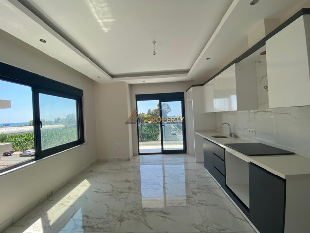 Квартира планировки 1+1, 55м2 в двух минутах от Средиземного моря, Каргыджак - Ракурс 3