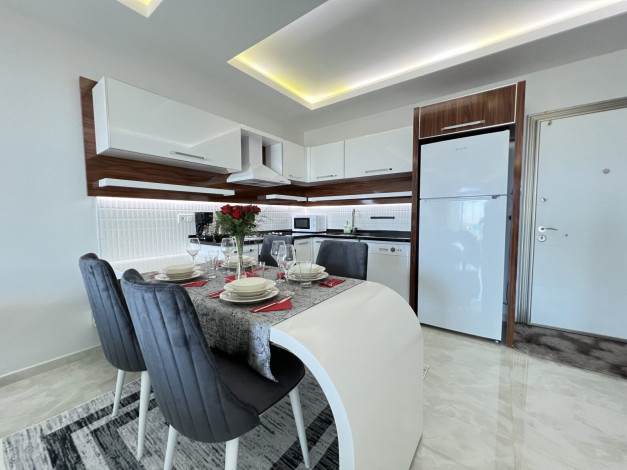 Просторная меблированная квартира планировки 1+1, 80м2 в районе Махмутлар - Ракурс 9