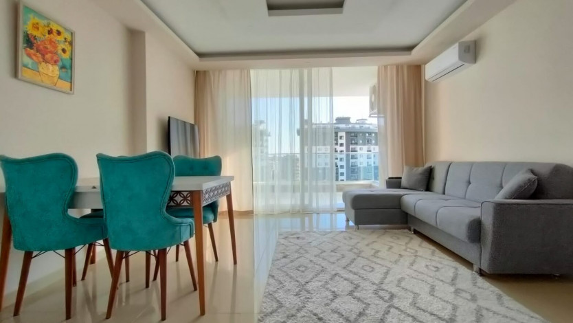 Меблированная квартира планировки 1+1, 60м2 в районе Махмутлар - Ракурс 12