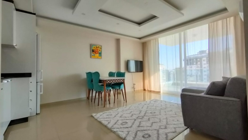 Меблированная квартира планировки 1+1, 60м2 в районе Махмутлар - Ракурс 14