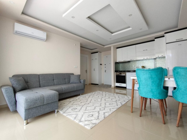 Меблированная квартира планировки 1+1, 60м2 в районе Махмутлар - Ракурс 17