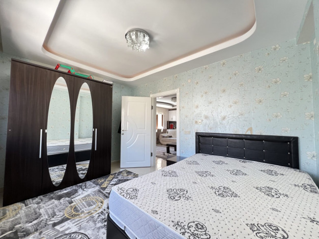 Меблированная квартира планировки 1+1, 60м2 в районе Махмутлар - Ракурс 13