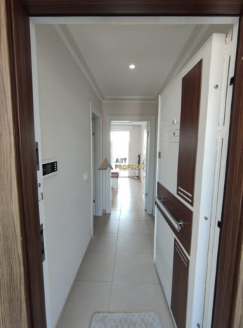 Меблированная квартира планировки 1+1, 60м2 в районе Махмутлар - Ракурс 3