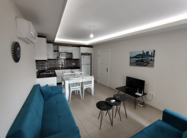 Меблированная квартира планировки 1+1, 60м2 в районе Махмутлар - Ракурс 6