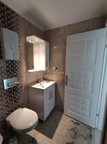 Меблированная квартира планировки 1+1, 60м2 в районе Махмутлар - Ракурс 9