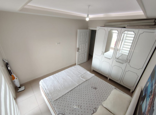 Меблированная квартира планировки 1+1, 60м2 в районе Махмутлар - Ракурс 18