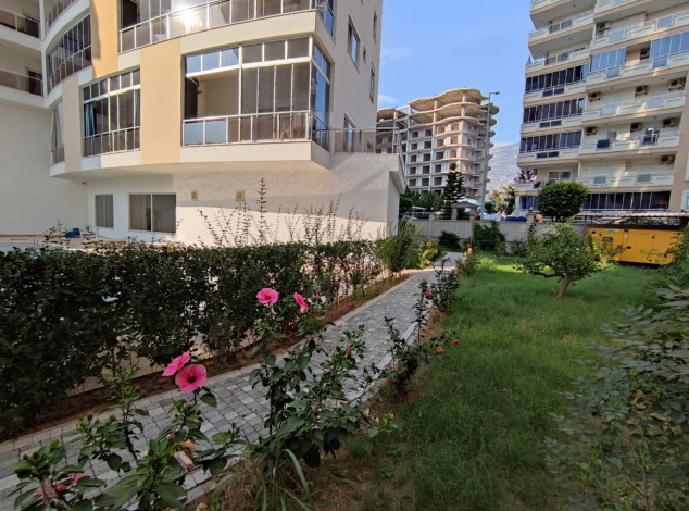 Меблированная квартира планировки 1+1, 60м2 в районе Махмутлар - Ракурс 19