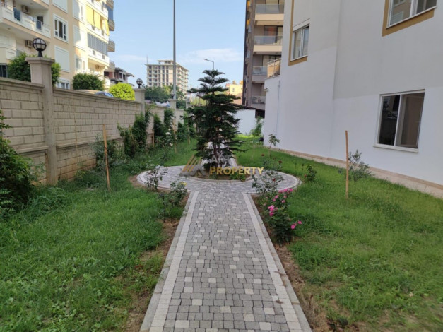 Меблированная квартира планировки 1+1, 60м2 в районе Махмутлар - Ракурс 21