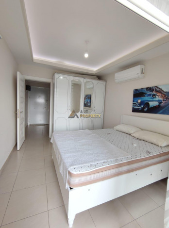 Меблированная квартира планировки 1+1, 60м2 в районе Махмутлар - Ракурс 27